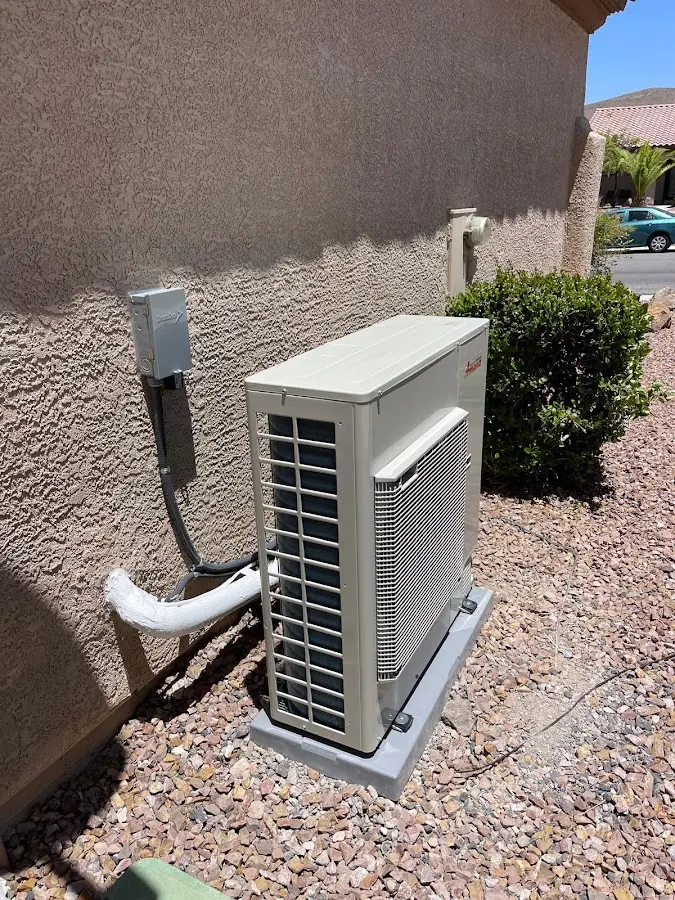 Residential air conditioning condenser unit in Rockford